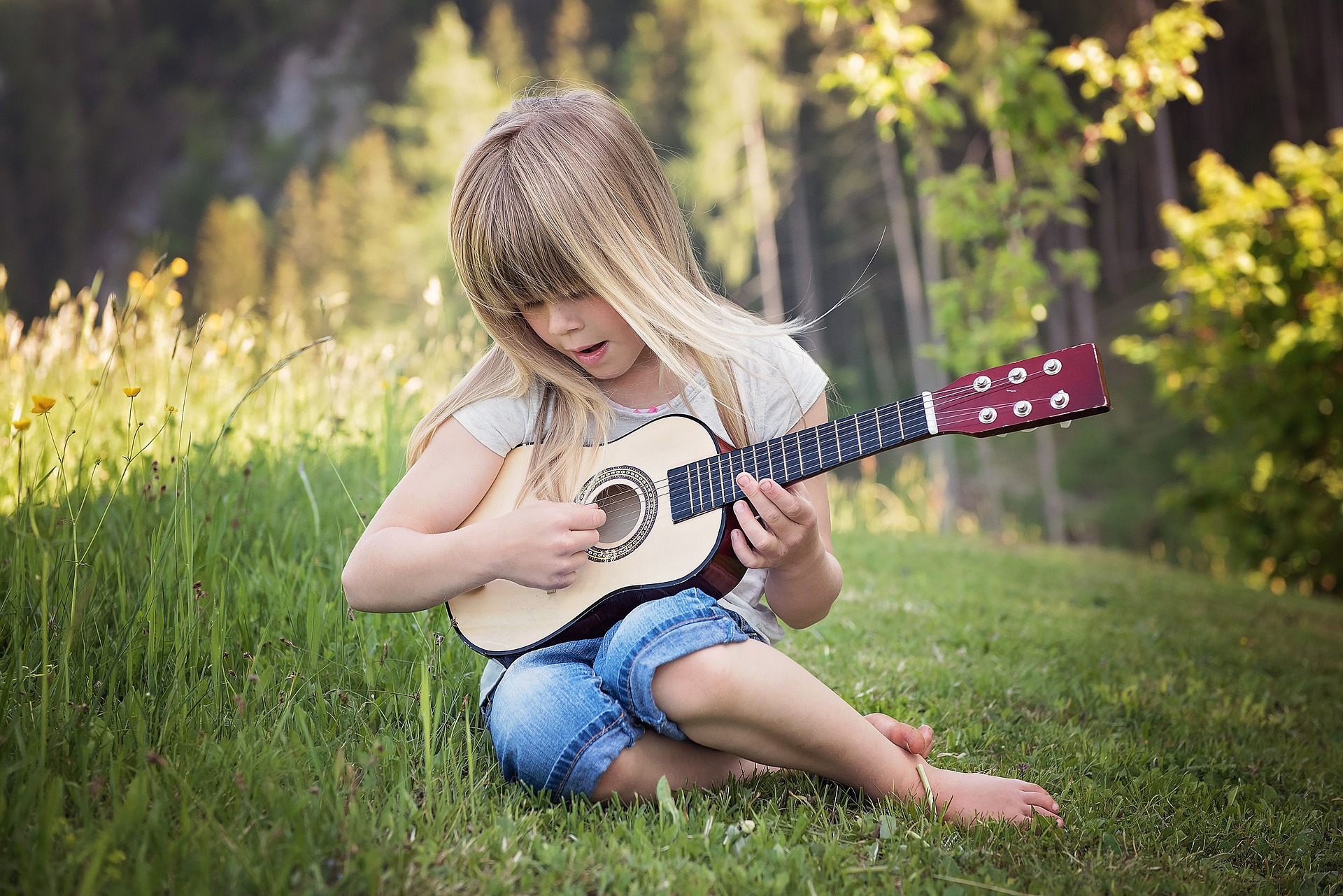 bimba con chitarra